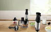 A kitchen counter with a Bosch hand blender and its accessories. Produktbild-Vorschau