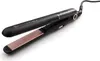 A black hair straightener with rose gold accents is shown on a white background. Náhľad obrázku produktu