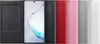 A Samsung Galaxy Note 10 phone with a black flip case and several colored flip cases lined up next to it. Produktbild-Vorschau