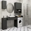 A modern bathroom with a washing machine, sink, and cabinets. Anteprima dell’immagine prodotto