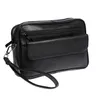 A black leather wrist bag is shown against a white background. Náhled obrázku produktu