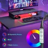 A gaming desk setup with a monitor, keyboard, mouse, and RGB lighting. Anteprima dell’immagine prodotto