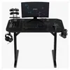 A gaming desk setup with a monitor, keyboard, mouse, controllers, headphones, and a water bottle holder. Produktbild-Vorschau