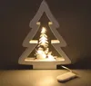 A decorative wooden Christmas tree with a snowman and LED lights inside. Produktbild-Vorschau