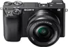 A black Sony Alpha 6100 camera with a 16-50mm lens is shown against a white background. Produktbild-Vorschau