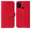 A red flip cover phone case with a floral and butterfly embossed design is shown open and closed. Produktbild-Vorschau