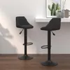Two black bar stools are shown in a room with a white wall and wooden floor. Náhled obrázku produktu