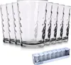 A set of clear drinking glasses with a textured surface, displayed in a studio setting with a white background. A packaging box for the glasses is also visible in the foreground. Náhled obrázku produktu