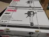 Multiple stacked boxes of Makita HM1812 demolition hammers. Anteprima dell’immagine prodotto