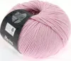 A ball of pink merino wool yarn with a label. Produktbild-Vorschau