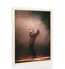 A framed picture of a singer performing on stage. Produktbild-Vorschau