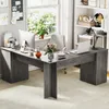 A home office setup with an L-shaped desk, computer, and decorative items. Produktbild-Vorschau