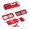 A set of red and clear plastic kitchen choppers and slicers laid out on a white background. Produktbild-Vorschau