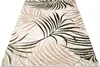 A rug with a palm leaf pattern is shown from a diagonal angle on a white background. Náhľad obrázku produktu
