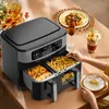 A dual-basket air fryer with food in both baskets, set on a table with some plates and drinks. Produktbild-Vorschau