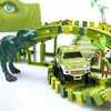 A toy dinosaur and a toy car on a toy race track. Produktbild-Vorschau