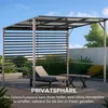 A modern pergola with slatted sides, a lounge chair, and a small table on a patio. Produktbild-Vorschau