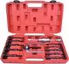 A red plastic case containing a set of tools, likely for bearing removal. Voir les images du produit