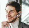 A man wearing a Bluetooth headset, smiling and looking to the side. Produktbild-Vorschau