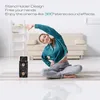 A woman is doing yoga in a living room with a speaker in the foreground. Náhled obrázku produktu