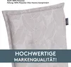 A close-up of a chair cushion with a leaf pattern and text overlays. Produktbild-Vorschau