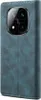 A close-up view of a blue leather flip case for a smartphone, showing the camera module area. Podgląd zdjęcia produktu
