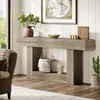 A living room scene featuring a console table with decorative items and storage baskets. Anteprima dell’immagine prodotto
