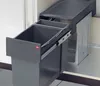 A built-in kitchen trash can system with two compartments, pulled out from a cabinet. Anteprima dell’immagine prodotto