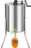 A stainless steel honey extractor with a crank handle and a spigot, dispensing honey into a glass jar. Anteprima dell’immagine prodotto