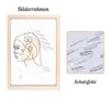 A framed picture of a woman's face in profile, with a protective film on a separate item. Produktbild-Vorschau