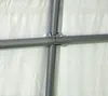 A close-up view of the metal frame and connectors of a shelter or tent. Produktbild-Vorschau