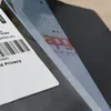 A close-up view of a phone screen protector with a label and a phone screen visible. Produktbild-Vorschau