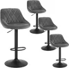 Four dark gray velvet bar stools with diamond tufting and black metal bases are arranged on a white background. Náhľad obrázku produktu