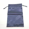 A dark blue drawstring bag against a white background. Náhled obrázku produktu