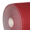 A close-up, rolled-up view of a dark red carpet. Anteprima dell’immagine prodotto