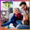 A father and daughter are sitting on the floor with their cat, next to a cat tree. Náhľad obrázku produktu