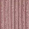 A close-up, full-frame shot of a pink upholstered bed frame with vertical channel tufting. Produktbild-Vorschau