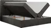 A dark gray upholstered boxspring bed with its mattress and topper lifted, revealing the storage compartment underneath. Produktbild-Vorschau