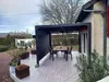 Abri de jardin  bioclimatique avec rideaux manuels 10.80 m2 Voir les images du produit 3