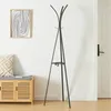 A coat rack and bench in a hallway. Náhľad obrázku produktu