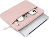 A pink laptop sleeve with a laptop partially inserted and accessories inside. Produktbild-Vorschau
