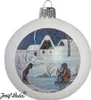 A white Christmas ornament with a winter scene illustration. Náhled obrázku produktu