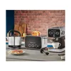 A Russell Hobbs kettle, toaster with toast, and espresso machine with a cup of coffee are displayed on a kitchen counter. Produktbild-Vorschau