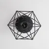 A black geometric wireframe light fixture with a socket in the center, viewed from directly above against a white background. Produktbild-Vorschau