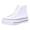 A white Converse Chuck Taylor All Star high-top sneaker with a platform sole, shown against a white background. Voir les images du produit