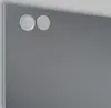A close-up view of a corner of a gray mirrored cabinet with two circular elements attached to the surface. Náhľad obrázku produktu