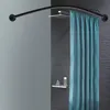 A shower curtain rod with a shower curtain and shower head in a bathroom. Podgląd zdjęcia produktu