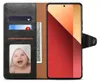 A flip-style phone case with a phone inserted, showing credit cards, cash, and a photo of a baby. Náhled obrázku produktu