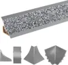 A collage of kitchen trim pieces, including a long profile view and several corner pieces. Anteprima dell’immagine prodotto