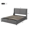A gray upholstered bed frame with a slatted mattress support is shown from a diagonal angle against a white background. Dimensions are indicated with lines and numbers. Produktbild-Vorschau